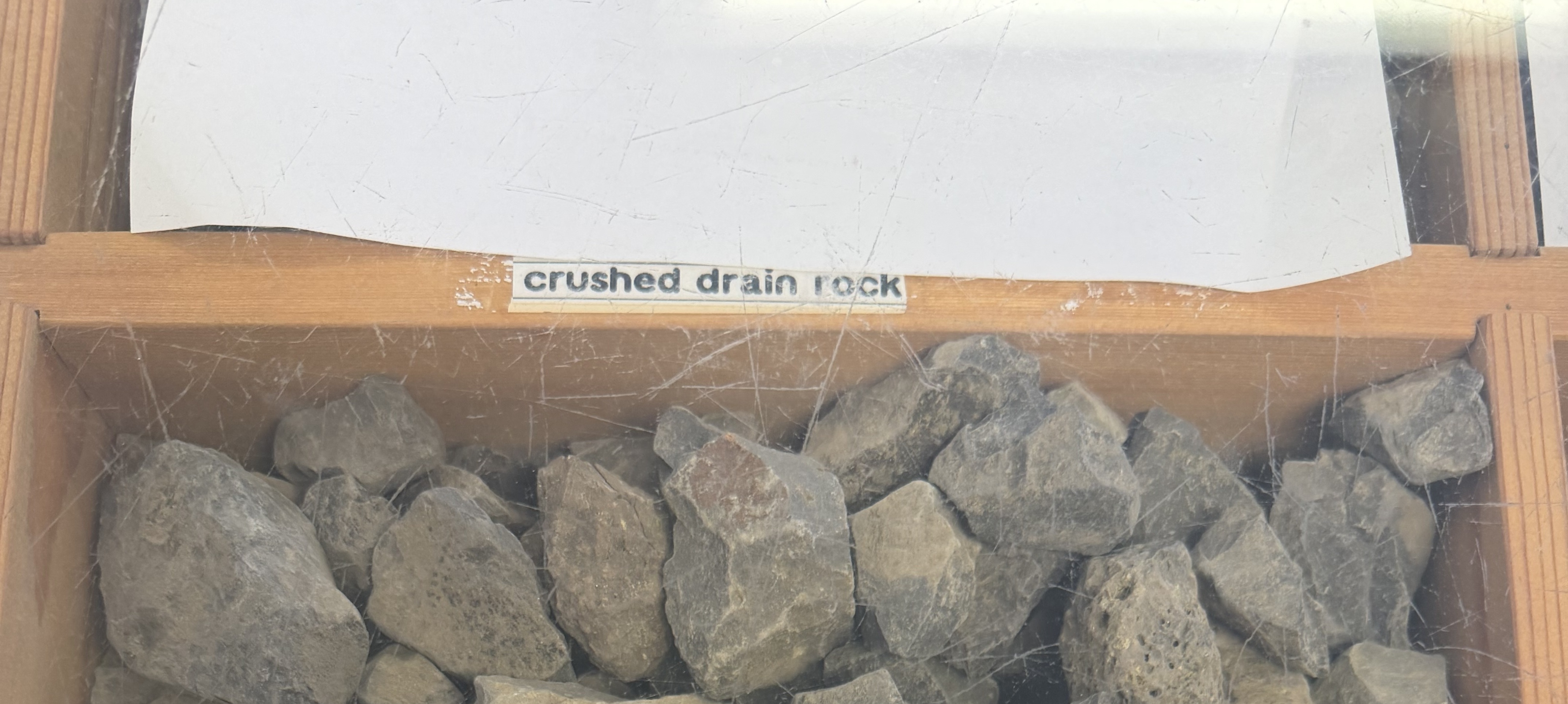 1.5 inch crushed drain rock material sample