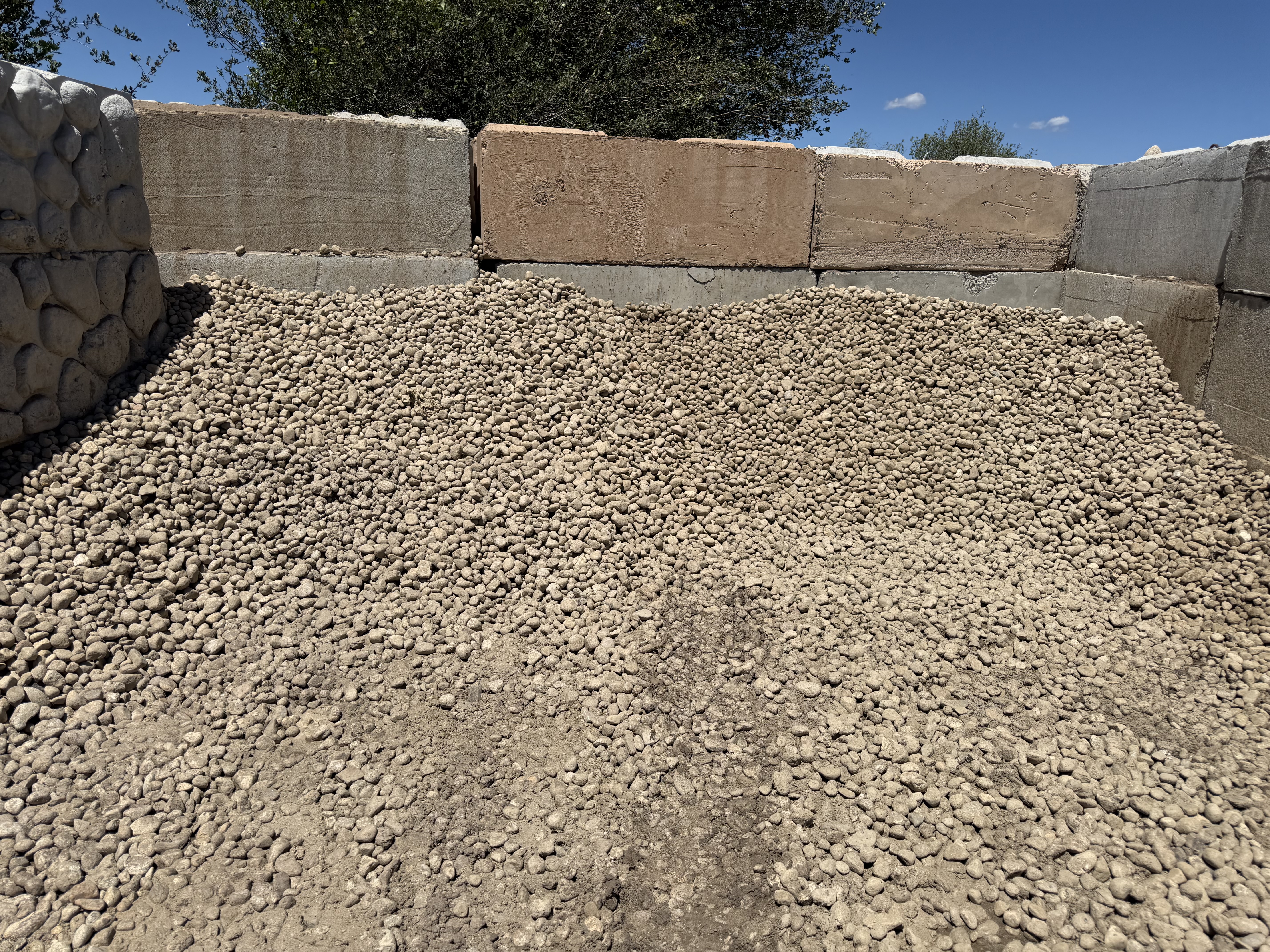 1.5 to 2 inch rounded river rock material pile